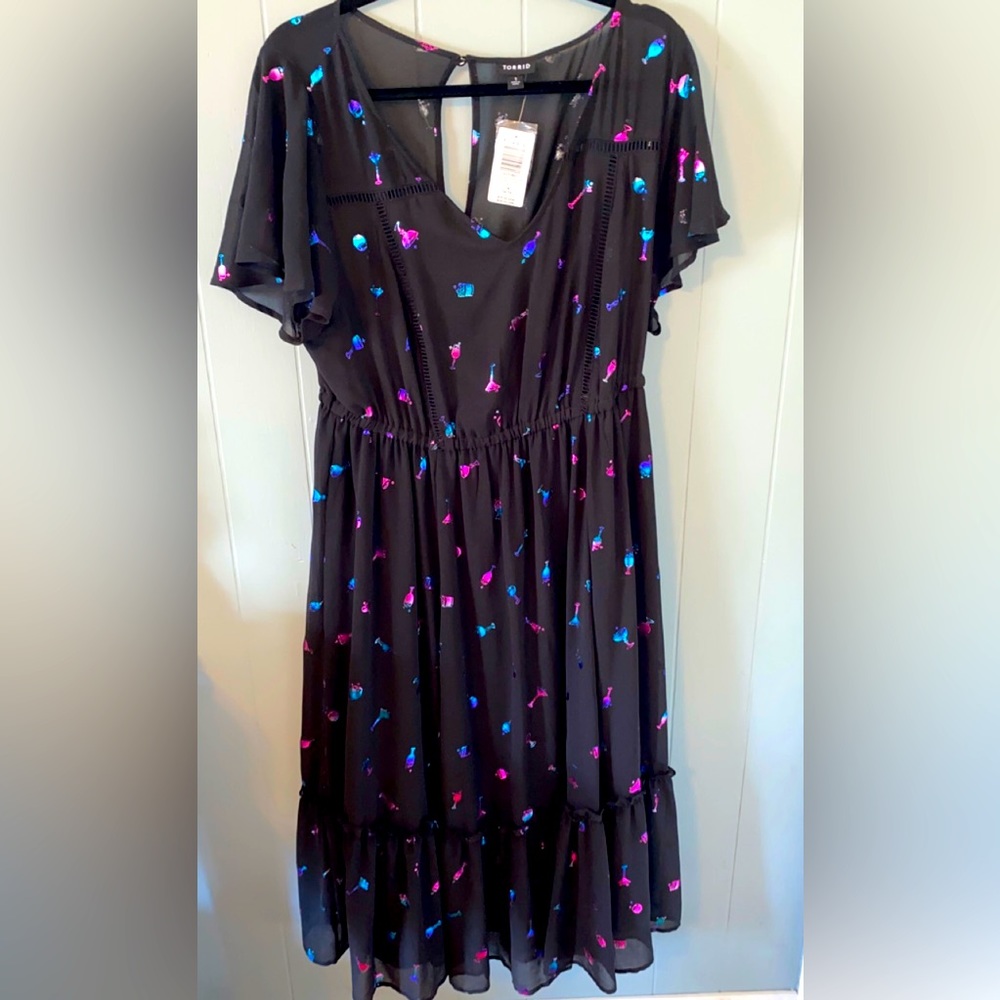 Black Torrid skate dress with Cocktail design